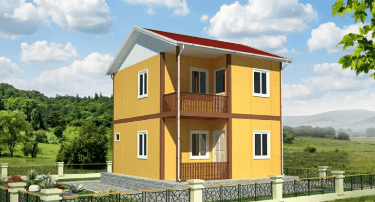 Geniş bir arazi içerisinde, yeşil doğa manzarasına karşı konumlandırılmış, sarı duvarlı ve kahverengi detaylı, iki katlı, balkonlu ve modern Alyans Prefabrik ev modeli.