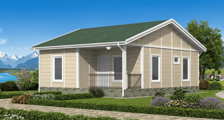 Alyans Prefabrik yeşil çatılı ve bej dış cepheli, karlı dağ manzaralı doğayla uyumlu tek katlı prefabrik ev modeli.